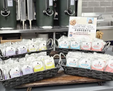 Lorelyns desserts in baskets beside a tent card