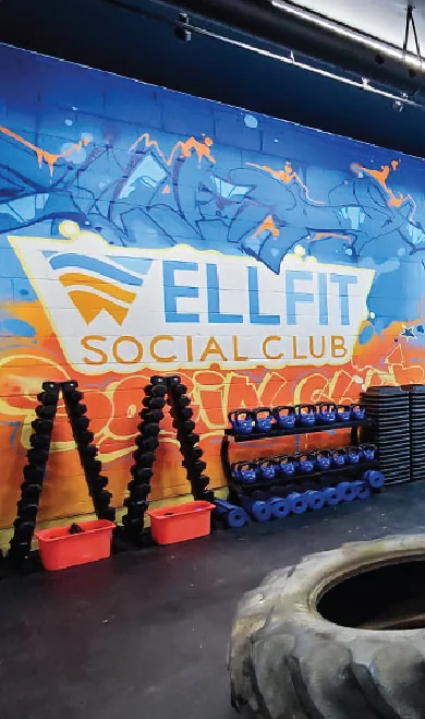 The Wellfit Social Club graffiti wall inside the gym